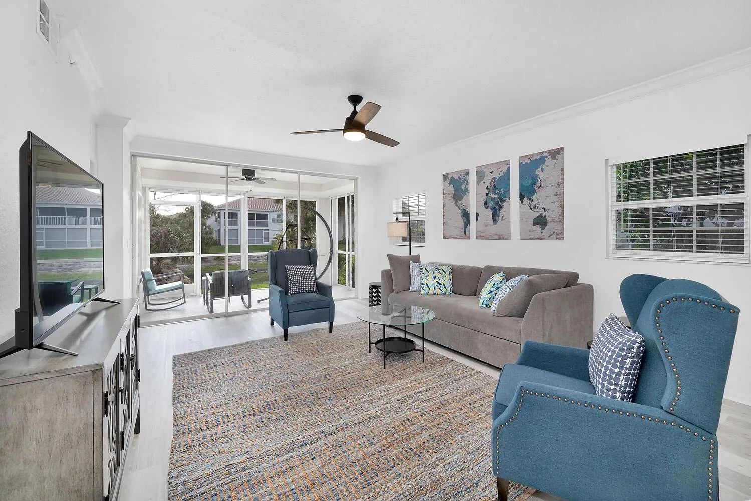 Bright living room in furnished Calusa Bay condo
