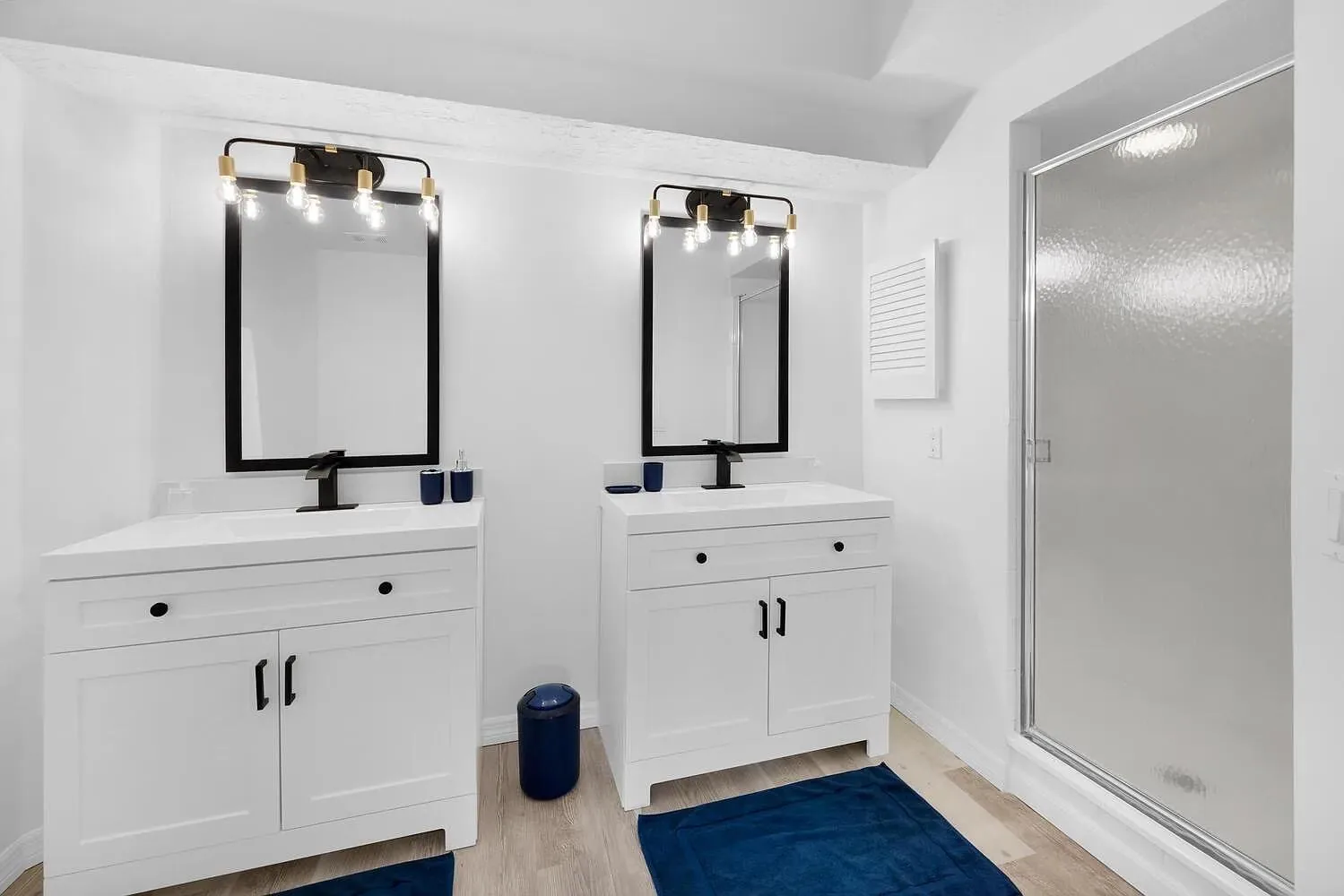 Bathroom with double vanity in Naples condo rental